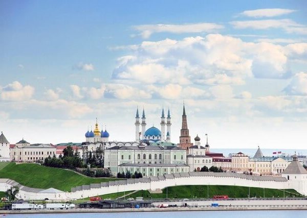 Kazan, Republic of Tatarstan, Russia. View of the Kazan Kremlin with: Presidential Palace, Soyembika Tower, Annunciation Cathedral, Qolsharif Mosque from the Kazanka River.