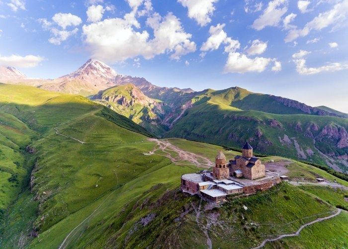 Gergeti trinity church with kazbegi mountain background