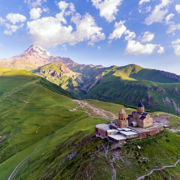 Gergeti trinity church with kazbegi mountain background